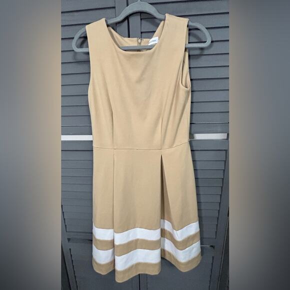 Calvin Klein Dresses & Skirts - Calvin Klein Sleeveless Tan Pleated Dress with White Stripes at Hem Line Size 6